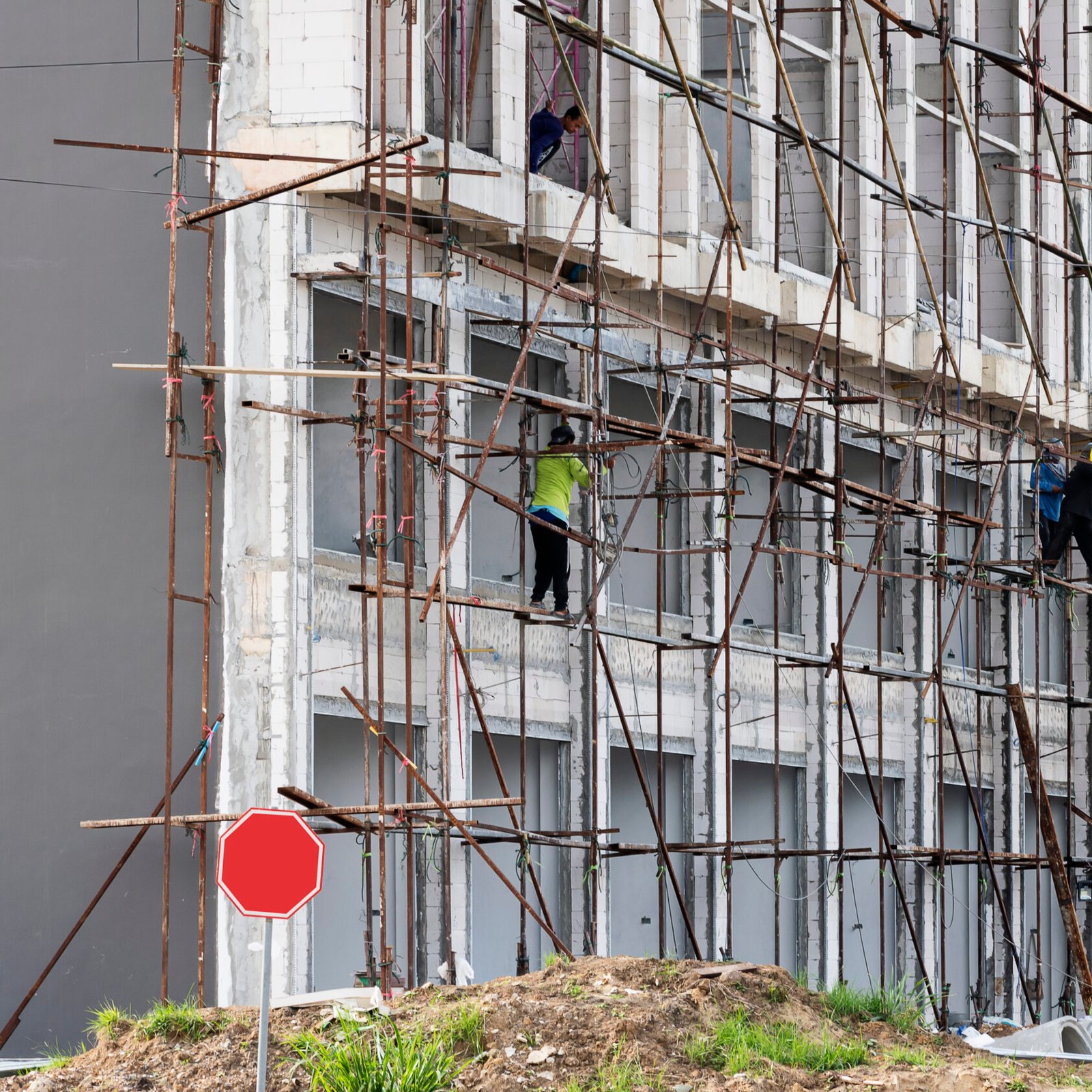 building construction site with steel scaffold