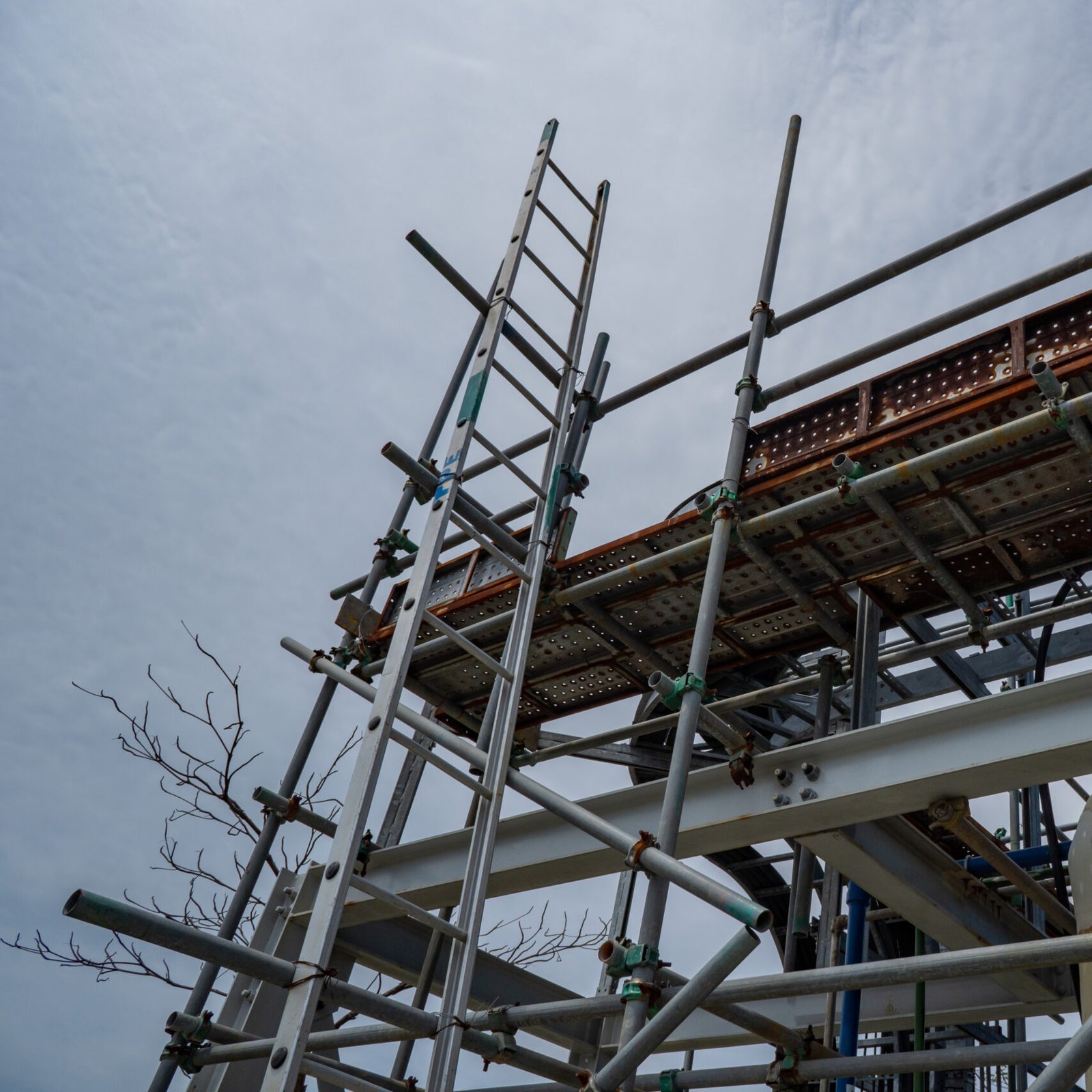 Temporary scafolding on pipe rack, at power plant project.